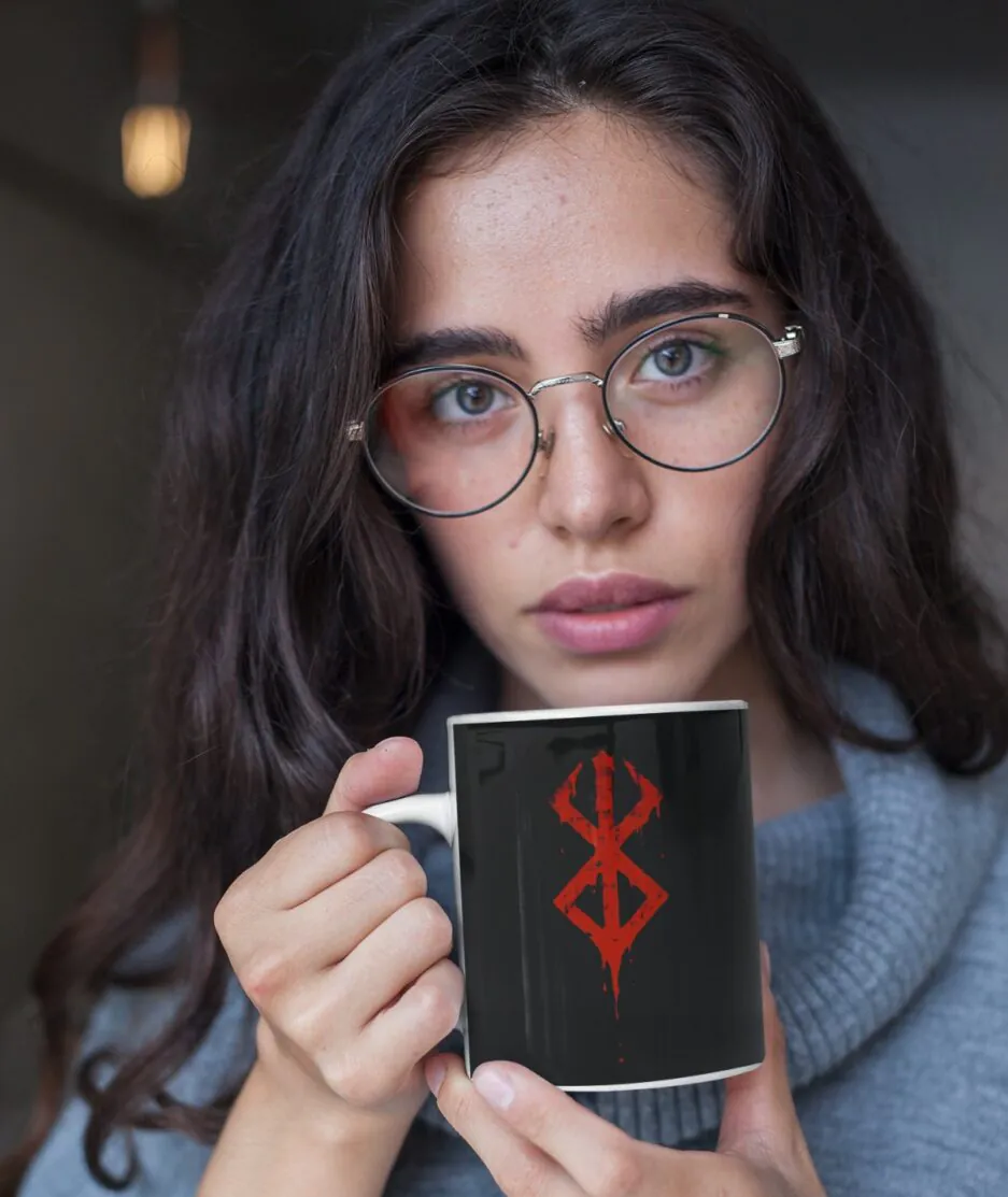 Woman holding Berserk Symbol white mug